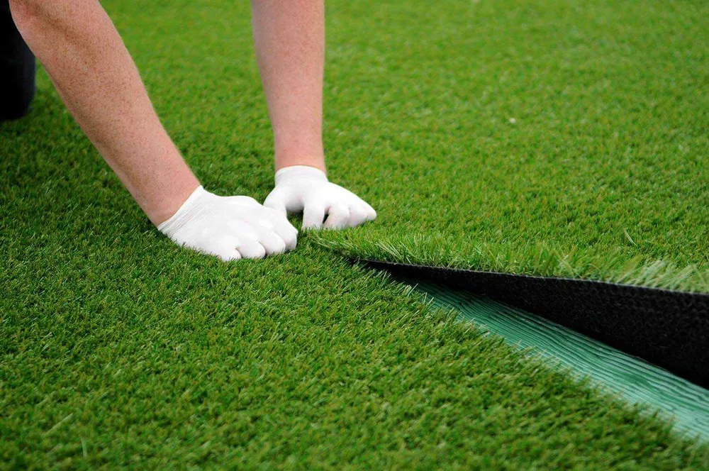 Do I need to prepare my garden before installing artificial grass?